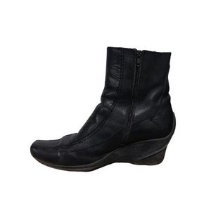 May include: Black leather ankle boots with a wedge heel and a zip on the side.