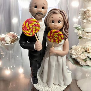 Bride and  Groom with  with lollipops keepsake  Customized Wedding Cake topper DEPOSIT ONLY