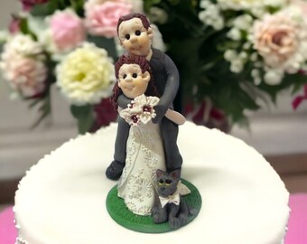 Bride carrying Groom with cat  custom made wedding cake topper- By Lynn’s Little Creations