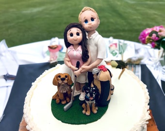 Custom Golfers Wedding Cake Topper with dogs handmade by Lynn’s Little Creations