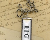 Love - Gvgeyu - Cherokee Language Pendant on White