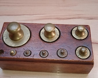 Brass weights in holder 19th century
