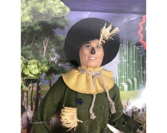 Barbie 50e anniversaire Le Magicien d’Oz Scarecrow Pink Label musical à collectionner