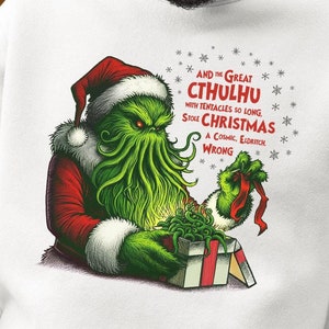 May include: A green and red Christmas jumper featuring a cartoon illustration of Cthulhu dressed as Santa Claus. The text on the jumper reads "And the Great Cthulhu with tentacles so long, stole Christmas. A Cosmic, Eldritch, Wrong."