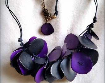 Black and purple Tagua nut bead necklace with leather, adjustable length. Seventies hippie style.