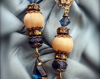 Midnight Escape ~ Long dangle earrings made with vintage jewelry parts in colors of the midnight starry sky. Dark blue, gold and champagne