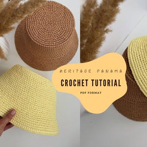 May include: Three crochet bucket hats in shades of brown and yellow are displayed. The hats are handmade with a visible stitch pattern. Text on a yellow shape reads "HERITAGE PANAMA CROCHET TUTORIAL PDF FORMAT."