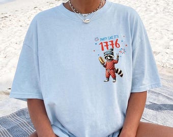 Vaterhaftes Waschbär 4. Juli Shirt, Party wie es ist 1776 USA Grafik-T-Stück