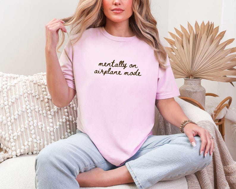 Comfort Colors 1717 t-shirt with the text “Mentally on Airplane Mode”, minimal travel-themed design. Funny airplane mode shirt for travel lovers, airport outfits, vacations, flights, introverts, and everyday casual wear.