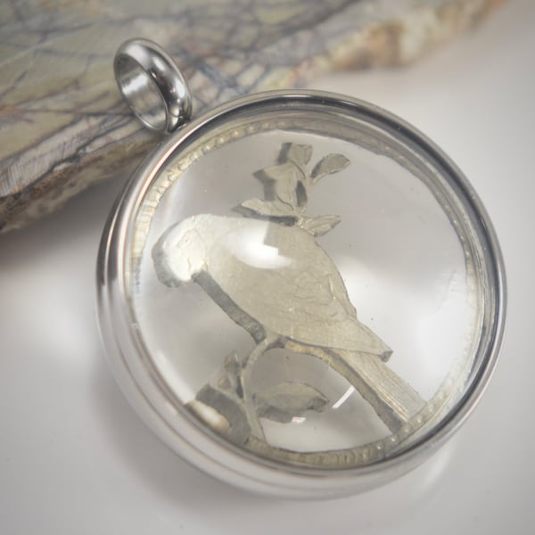 Hand Sawn Parrot Cut From A Columbian Coin Set In A Magnifying Locket Pendant