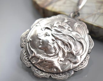 A Filagree Framed Feminine Profile Vintage Art Nouveau Design Sterling Silver Pendant