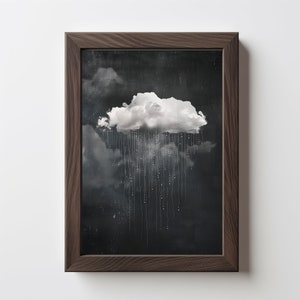 Może przedstawiać: Oprawiony wydruk artystyczny przedstawiający monochromatyczny obraz chmury i deszczu. Chmura jest biała na ciemnoszarym tle, a deszcz przedstawiony jest jako pionowe linie białych kropek. Rama jest z ciemnobrązowego drewna.