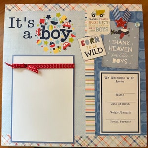 Scrapbook albums paired with Hello Baby Paper Packs – perfection