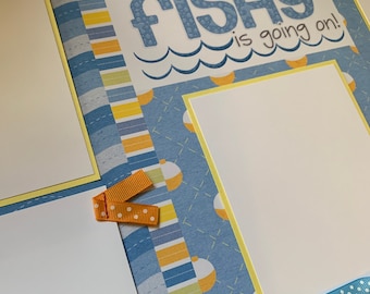 Pagine di album di pesca: layout predefinito "Qualcosa di sospetto" 12x12