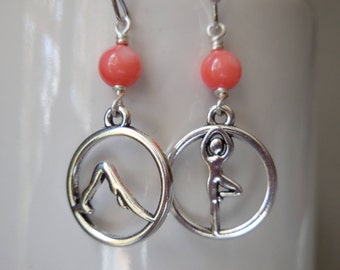 Yoga earrings with coral color shell pearls. Sun salutation yoga position dangle earrings. Yoga poses zen meditation jewelry. Silver plated.