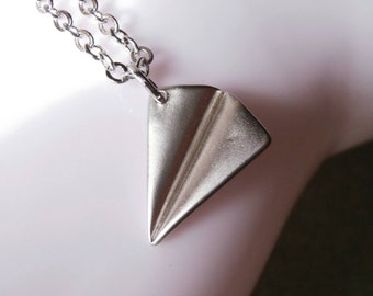 Airplane necklace. Little silver airplane charm necklace. Silver plated jewelry. 3D folded origami airplane silver paper aircraft travel