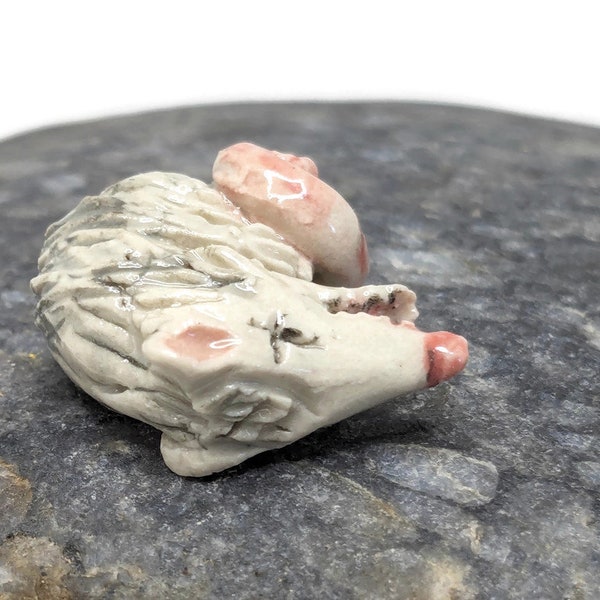 Miniature opossum figurine