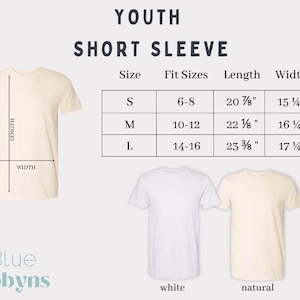 May include: Cream-colored youth short sleeve t-shirt with size chart. The chart shows measurements for sizes S, M, and L, with lengths ranging from 20 7/8" to 23 3/8" and widths from 15 1/4" to 17 1/4". Two additional t-shirts are shown, one white and one natural.