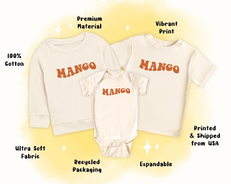 May include: Three cream-coloured shirts with the word "MANGO" printed in orange on each. The shirts are a long-sleeved sweatshirt, a short-sleeved t-shirt, and a bodysuit.