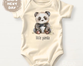 May include: A cream-colored baby onesie with short sleeves features a watercolor illustration of a panda bear sitting on a bed of leaves. The text "little panda" is printed below the panda.