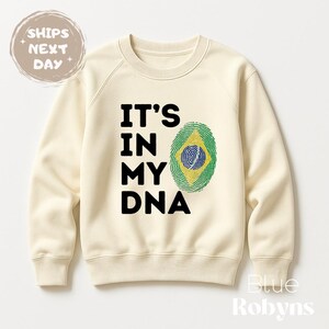 Brazilian heritage gift idea

Brazil ancestry shirt for baby

cultural pride family outfit

fingerprint flag Brazil shirt

Brazil national pride clothing

It’s in my DNA t-shirt Brazil flag

Brazilian descendant t-shirt