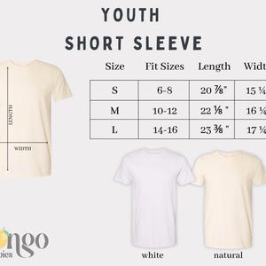May include: Youth short sleeve t-shirt size chart with measurements in inches. The chart shows sizes S, M, and L with corresponding fit sizes, lengths, and widths. Two t-shirts are shown below the chart, one in white and one in natural.