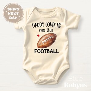 Daddy Loves Me More Than Football Baby Bodysuit Cute Baby Shower Gift for Newborn Outfit Football Fan Tshirt Football Dad Gift Father&#39;s Day