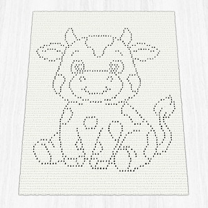 May include: A rectangular white crochet blanket featuring a black stitched graphic of a seated cow. The cow design is created using individual black stitches against the white background, showing a smiling face, ears, spots, and a tail.