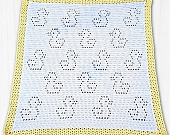 May include: A crocheted baby blanket featuring a light blue center with a pattern of duck silhouettes. The blanket has a yellow border. The duck pattern is created with small, evenly spaced holes, giving it a delicate appearance.