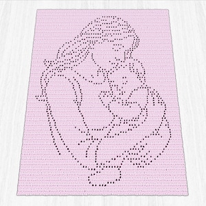May include: A light pink crocheted blanket with a black outline depicting a mother and baby. The design is a simple illustration, suitable for a nursery or as a baby shower gift. The blanket is rectangular in shape.