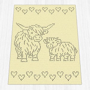 May include: A rectangular cream-coloured crochet blanket featuring a dark brown pixelated design of a Highland cow and a calf. The top and bottom borders are decorated with a row of small, dark brown heart shapes arranged in a horizontal line.