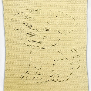 May include: A crocheted blanket in a soft yellow color, featuring a detailed outline of a sitting puppy. The puppy design is created with openwork, adding texture and visual interest to the blanket. The blanket is a square shape.