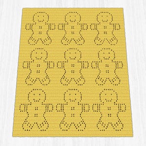 Könnte beinhalten: Eine gelb gehäkelte Decke mit einem sich wiederholenden Muster von Lebkuchenmännchen-Figuren. Die Lebkuchenmännchen sind mit dunkelbraunen Stichen umrandet, und die Decke hat ein strukturiertes Aussehen.