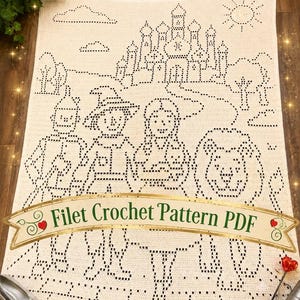 May include: A cream-colored filet crochet blanket featuring a dark outline design of four characters standing before a castle, trees, clouds, and a sun. A banner across the bottom displays the text Filet Crochet Pattern PDF in green letters.