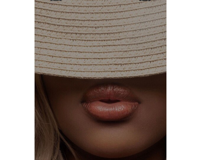 Glossed in Mystery: Bold . Unapologetically soft.