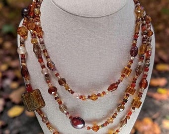 Browns and Gold extra long glass beaded Necklace