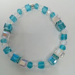 Turquoise and Clear Cube Crystal stretch bracelet.
