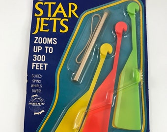 Vintage Nuevo en el paquete NOS 1960's Era Star Jets Lanzamiento de juguete