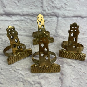 Set of 4 Vintage 1980’s Era Brass Lighthouse Napkin Rings