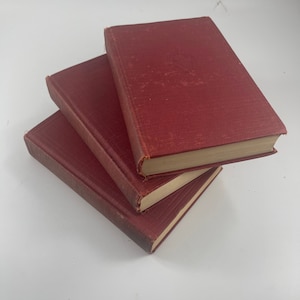 Three Volumes of Vintage New Standard Encyclopedia Small Red Hardback Books