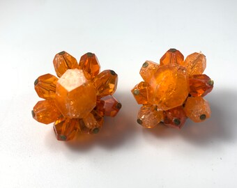 orange colored earrings 1980