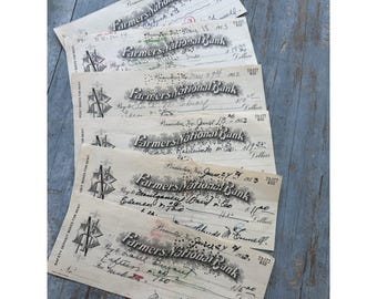 6 cheques cancelados antiguos de la década de 1950 del Farmers National Bank de Princeton, Kentucky.