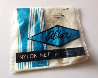 Vintage Neu im Paket Aldora Blonde Nylon Haarnetz mit funkelnden Perlen