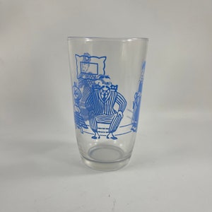 Vintage SWANKY SWIG 1950er Jahre Juice Glass mit blauem, wunderlichen Mann und Frau Design