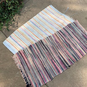 Two Vintage Multicolor Woven Rugs One Light Colored Stripes and One Dark Colored Stripes