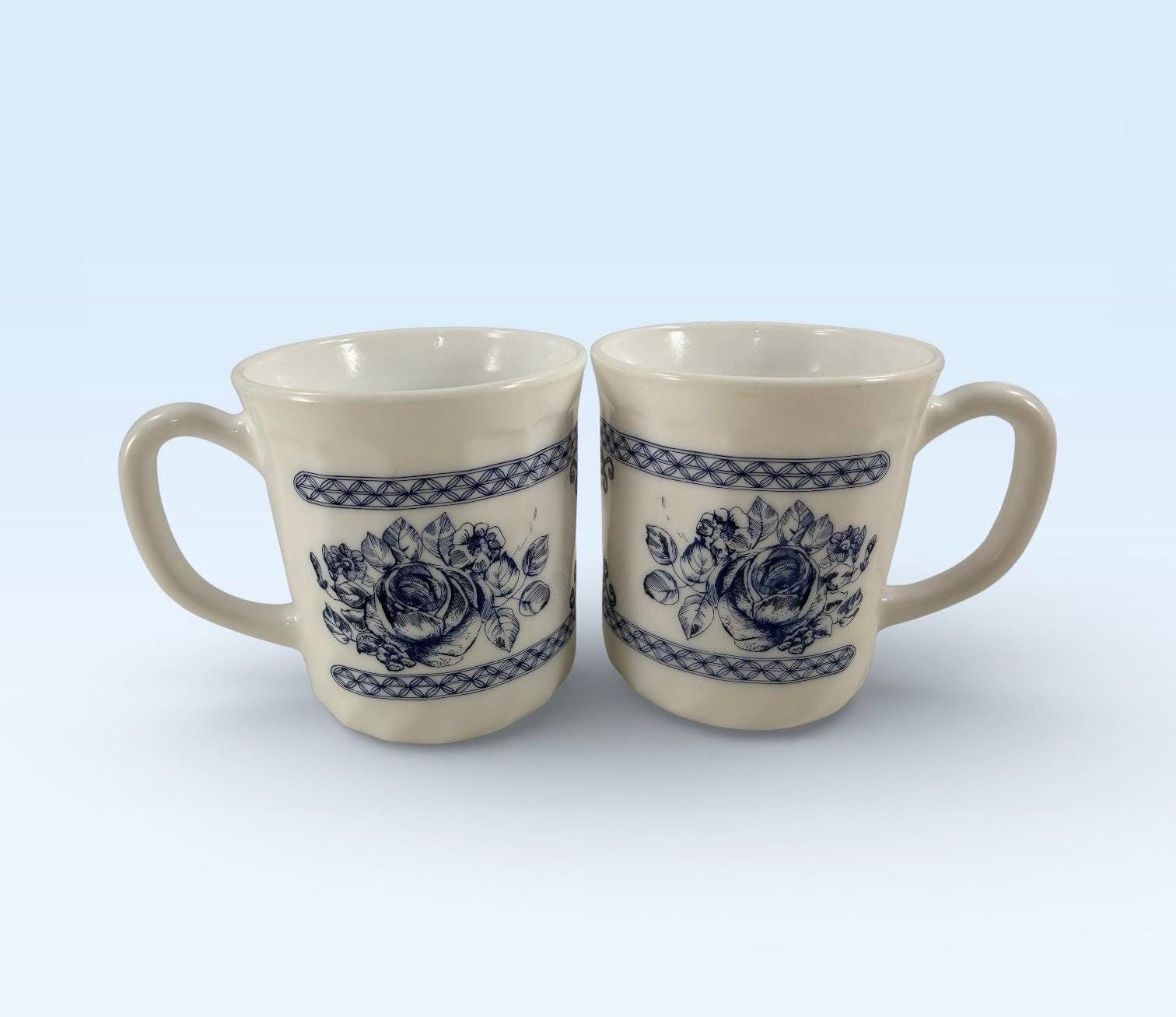 Pair of Vintage Arcopal France Honorine Blue Rose Floral Coffee Cup or Mug