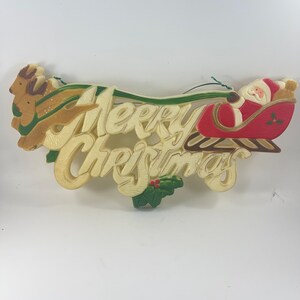 VIntage Hard Plastic Merry Christmas Wall Hanging Santa Claus and Reindeer