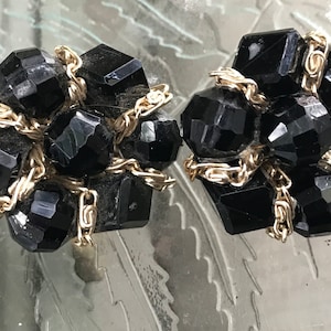 Pair of Vintage Black and Goldtone Clip On Earrings