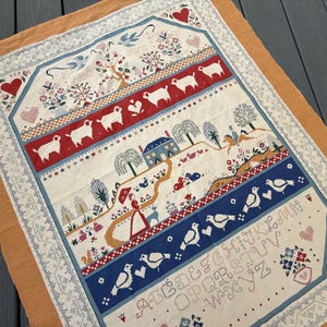 Tapiz de tela vintage Fabri-Quilt Cuddle Prins Cheater, muestrario del alfabeto