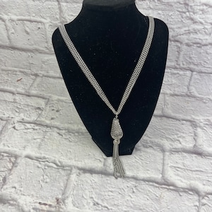 Vintage 1970’s Era Art Deco Style Designer Sarah Coventry Triple Chain Silvertone Necklace With Tassel Pendant